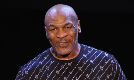 Mike Tyson Hugs Man Who Pulls Gun Out In Club